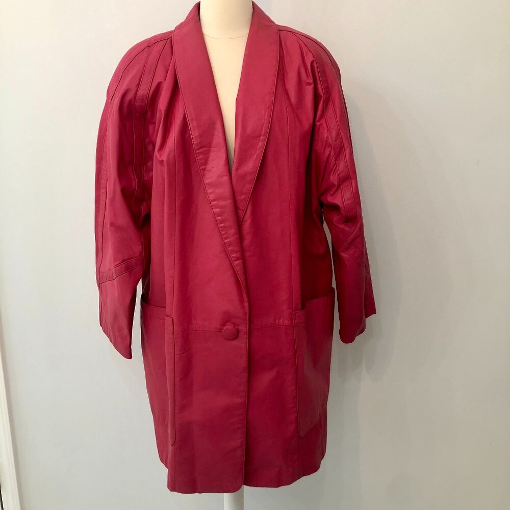 1980s hot pink long leather coat with button closure and batwing sleeves size 10